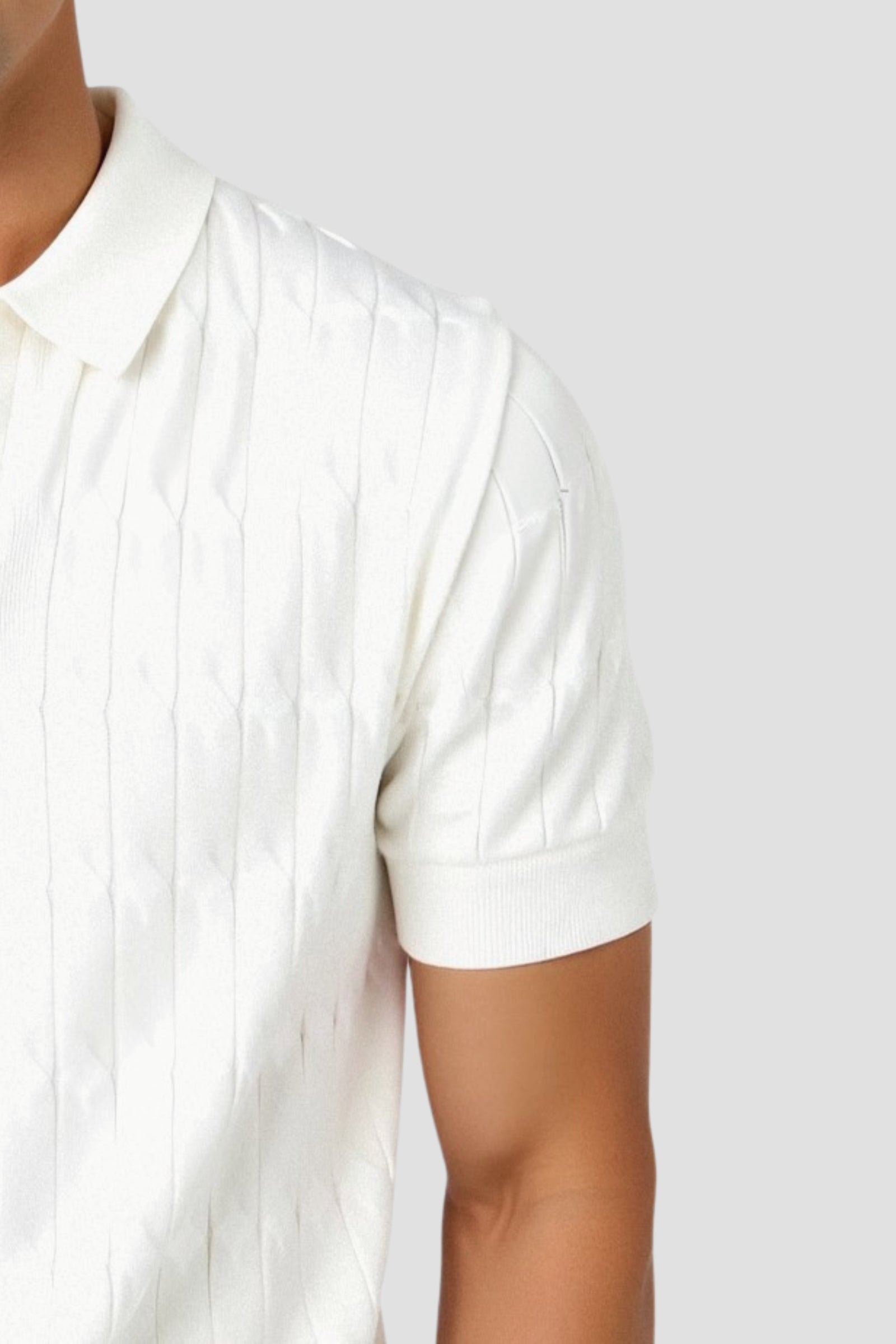 Polo en maille torsadée à col en V de qualité supérieure